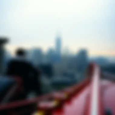 The Iconic Skyline of New York with a Thrilling Ride Iconic skyline view of New York City with a roller coaster in the foreground