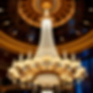 Symbol of Sophistication A beautifully lit chandelier enhancing an extravagant space.